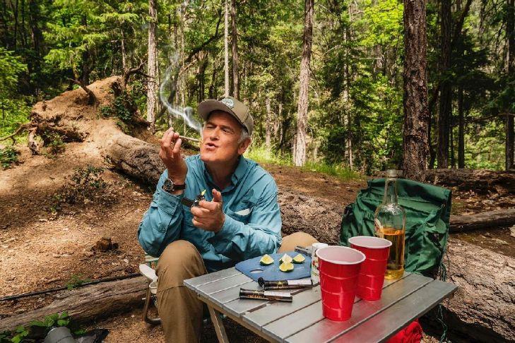 Bruce-Campbell-as-Ernie-smokes-a-joint-a